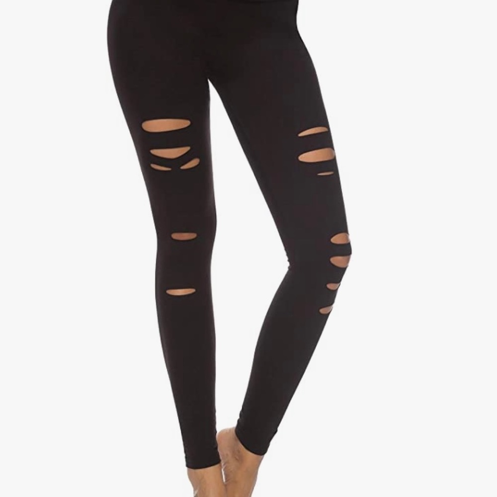 Ripped dibaolong leggings in black size M.‎
